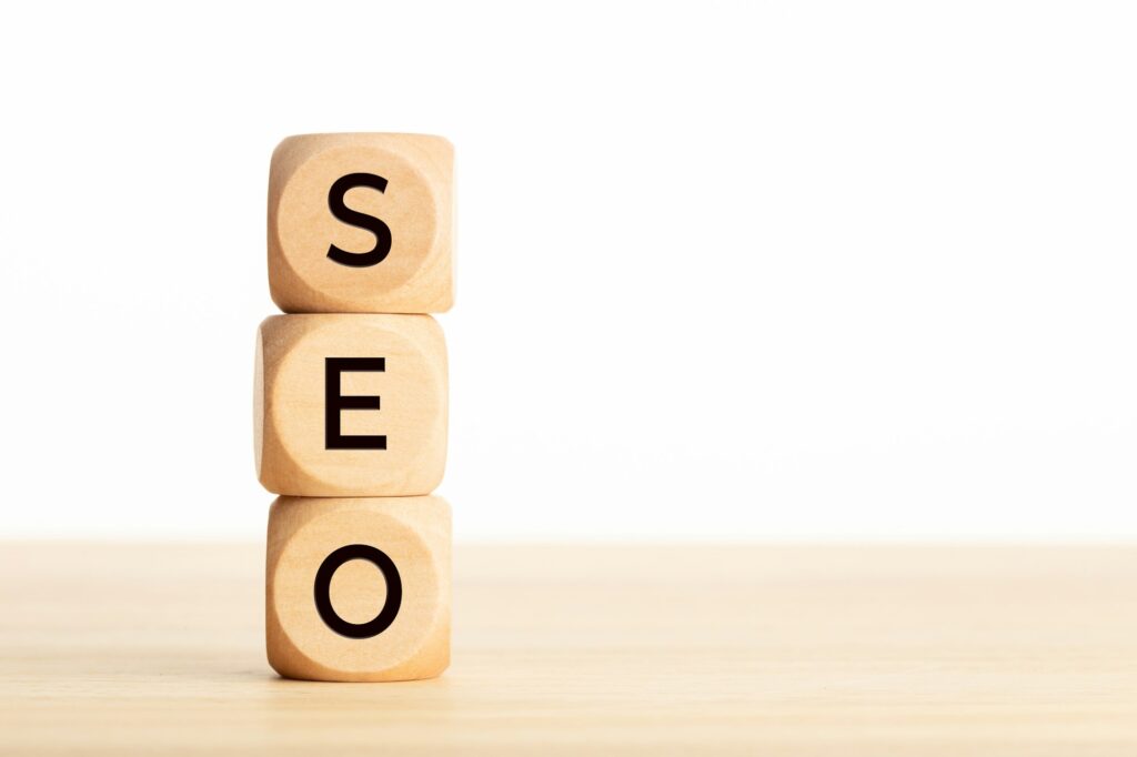 SEO word in wooden blocks on table