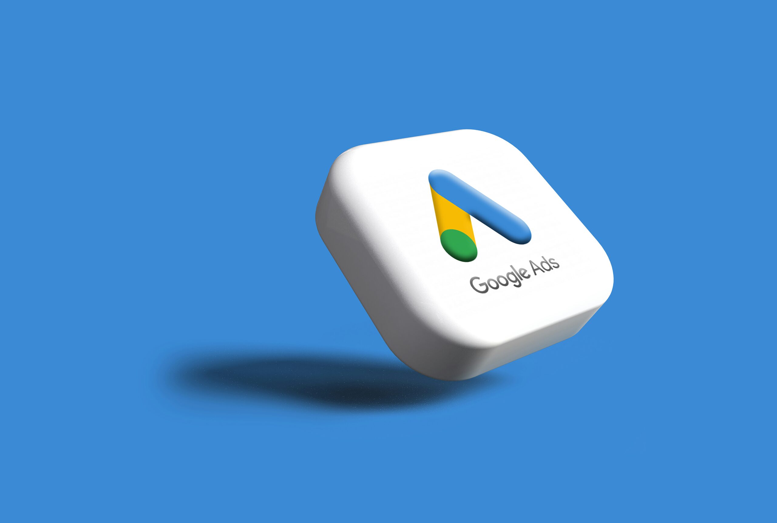 A 3D Google Ads icon floating against a blue background, representing professional Google Ads management for small business growth.